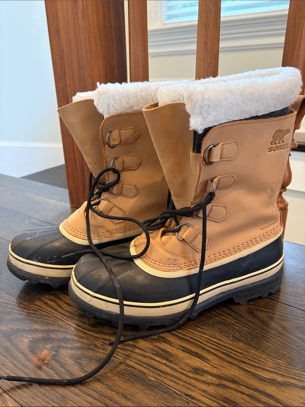 Sorel Tan and Black Lace-Up Snow Boots